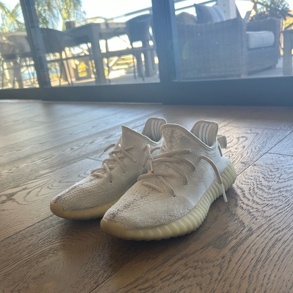 Used YEEZY BOOST 350. A few scuff marks and no sole on inside. Originally 450.
